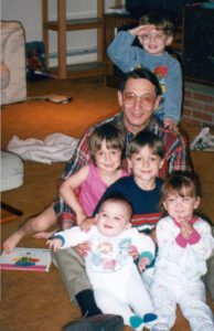 The author's father z"l with his grandchildren